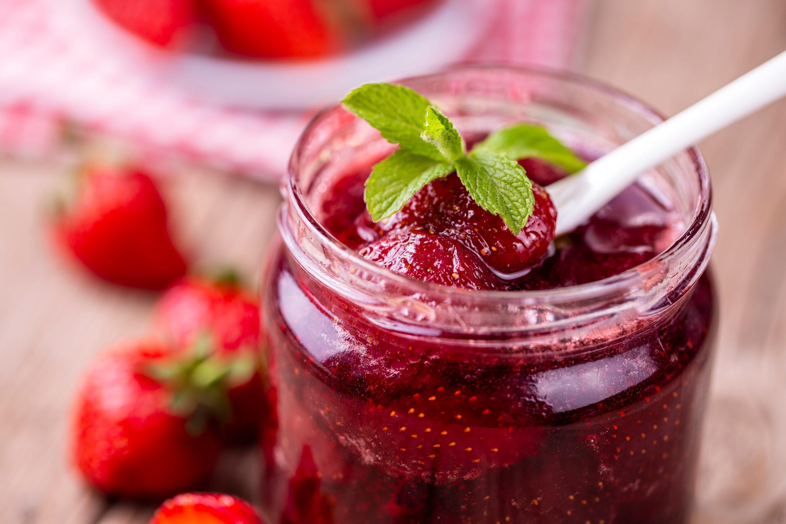 Strawberry Preserve with Spoon and Fresh Fruit